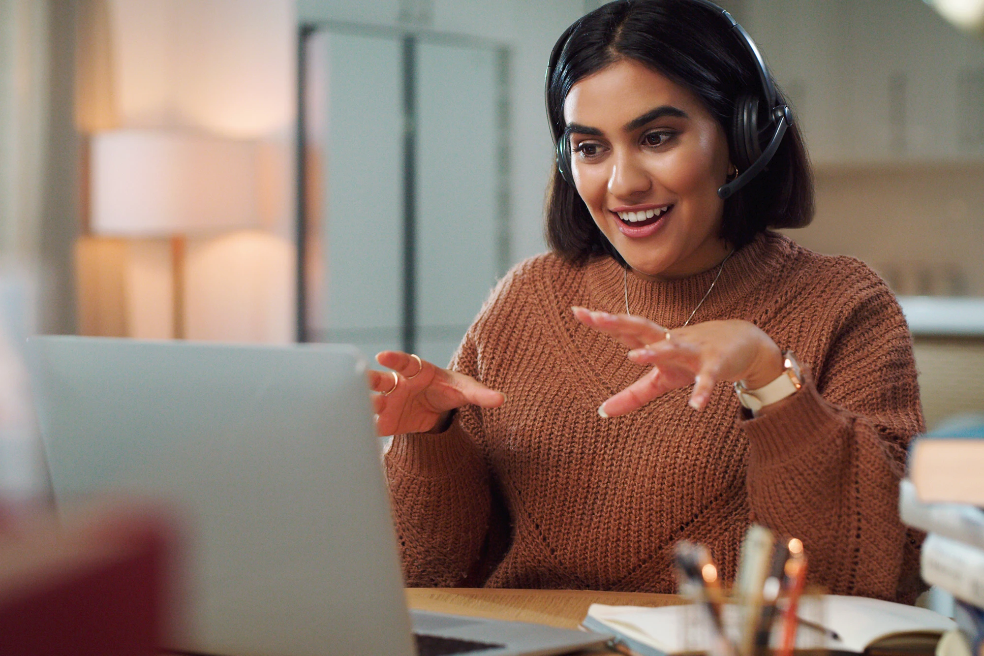 a tutor having a conversation with her student over the web meeting